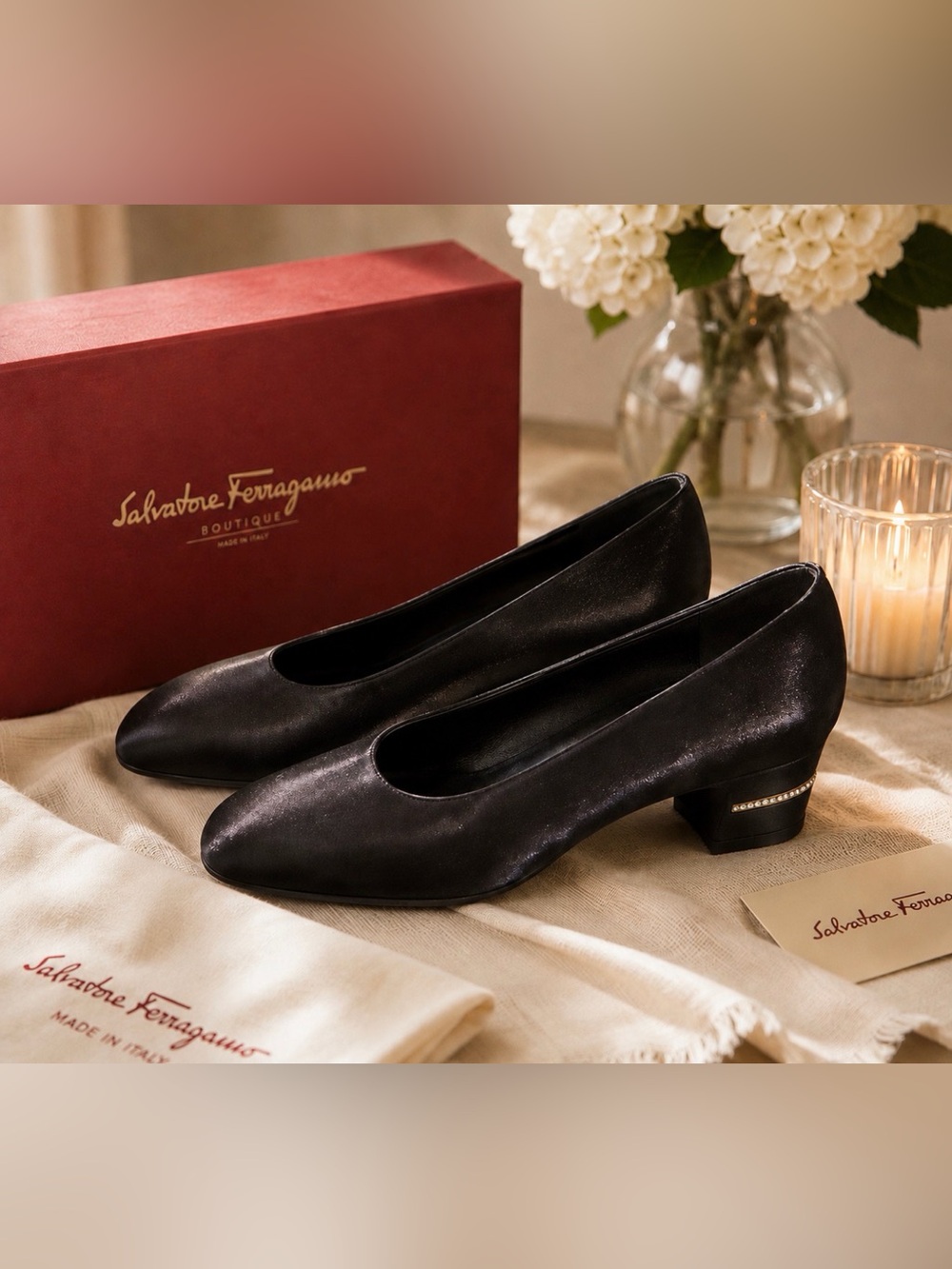Salvatore Ferragamo size 8.5 black pumps with rhinestones on the heels